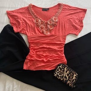 Peach blouse, beaded neckline